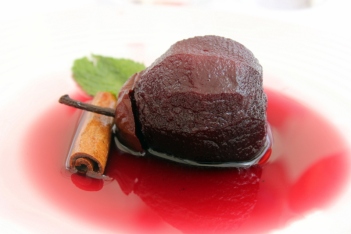 Red wine poached pear with cinnamon